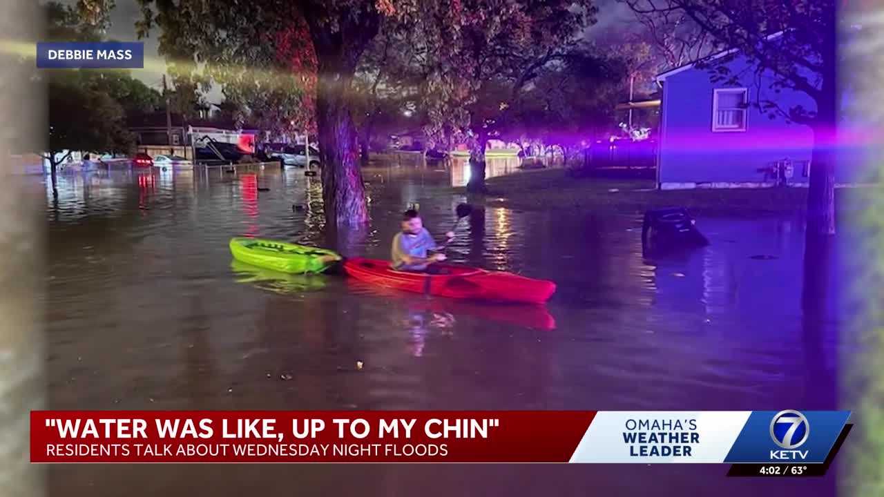 'Water was, like, up to my chin': Neighbors work together to escape rising floodwaters