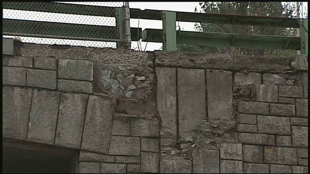 Bricks fall from bridge facade
