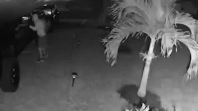 Caught on camera: Cape Coral car burglar scared off by security system