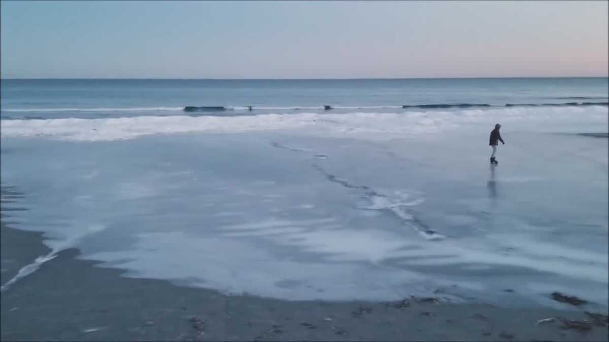Man's ice skating escapade on frozen Maine beach captured on video