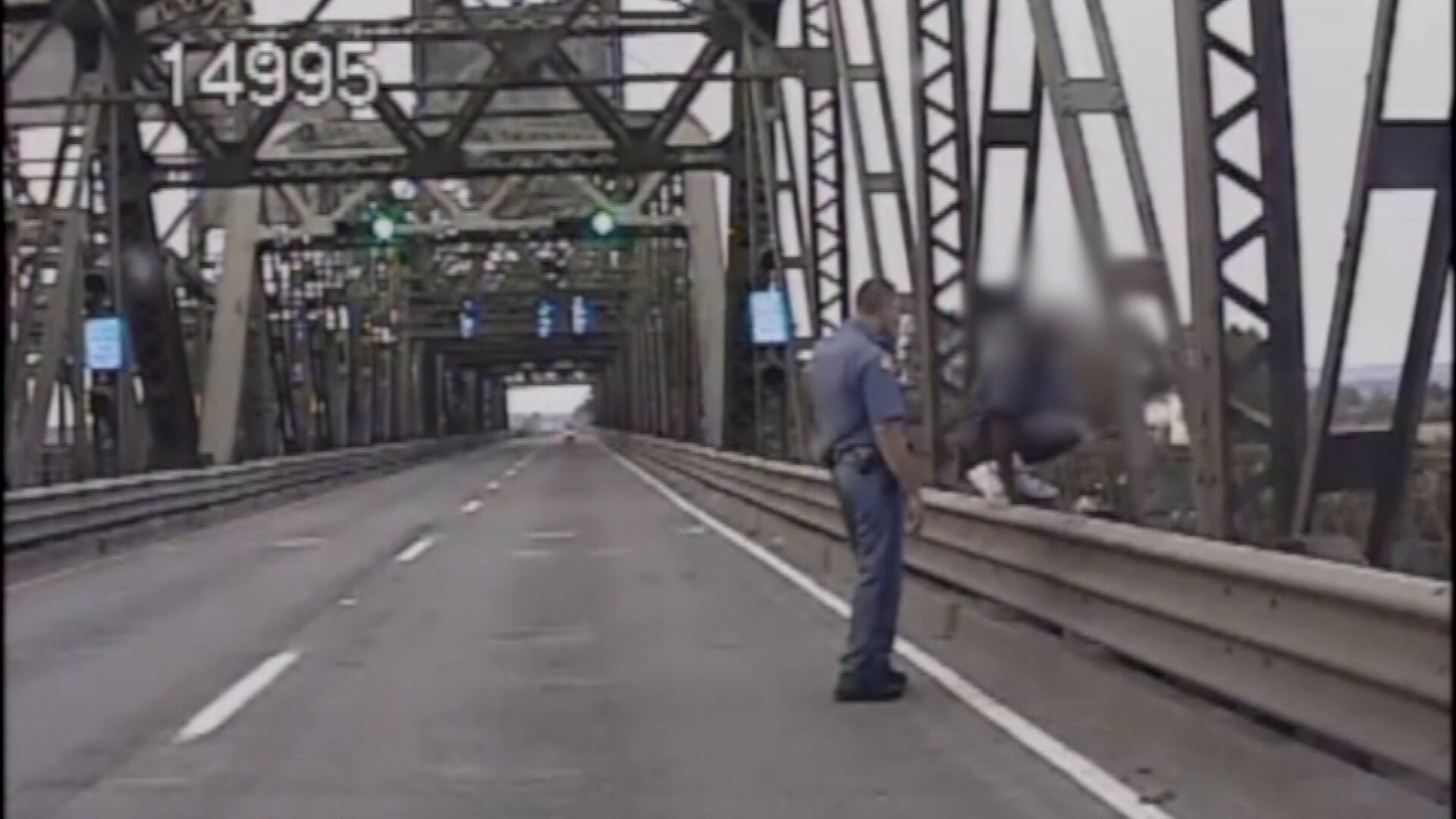 Dramatic Video Shows Heroic State Trooper Save Man From Jumping Off Bridge