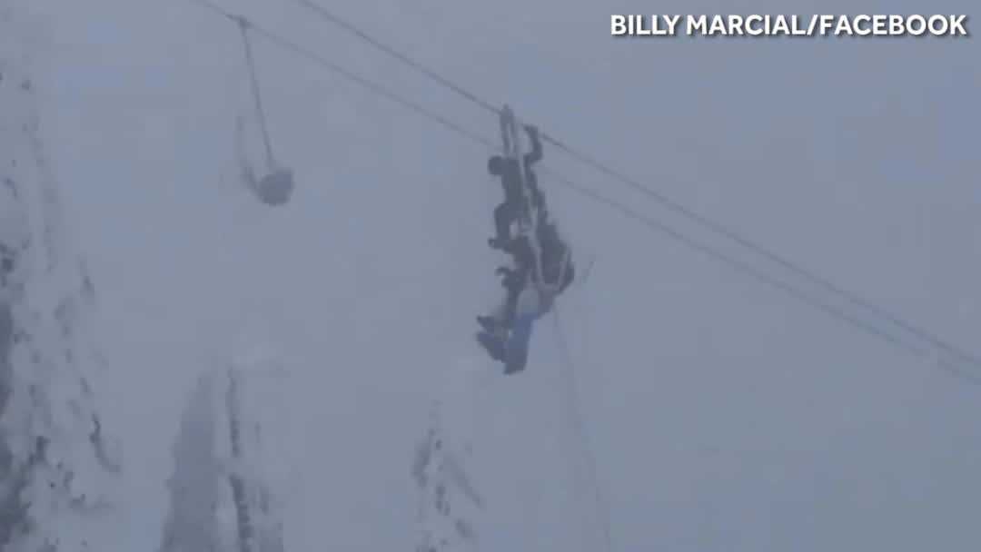 Watch Skiers stuck on chair lift up to 100 feet above ground evacuated