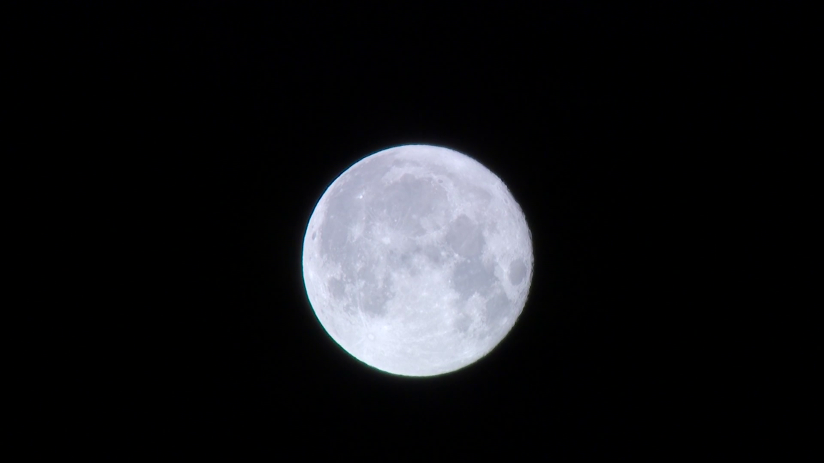 Rare blue micromoon dances through Massachusetts sky