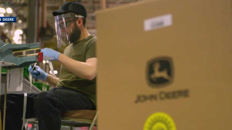 John Deere workers manufacturing thousands of face shields