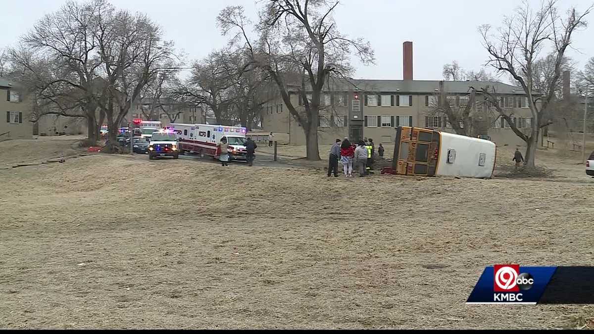 School bus hits icy patch, flips on side