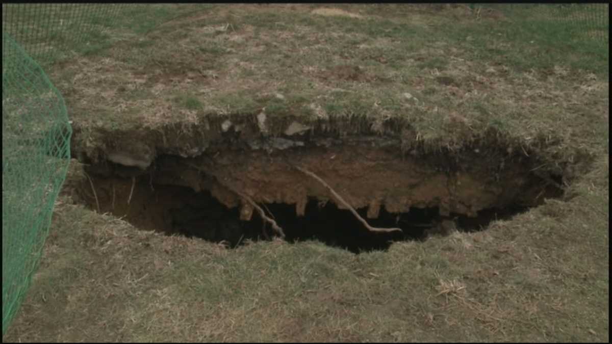 Backyard sinkhole uncovers underground structure