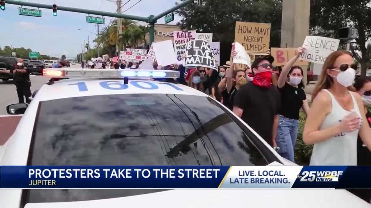 Jupiter protesters march along Indiantown Road