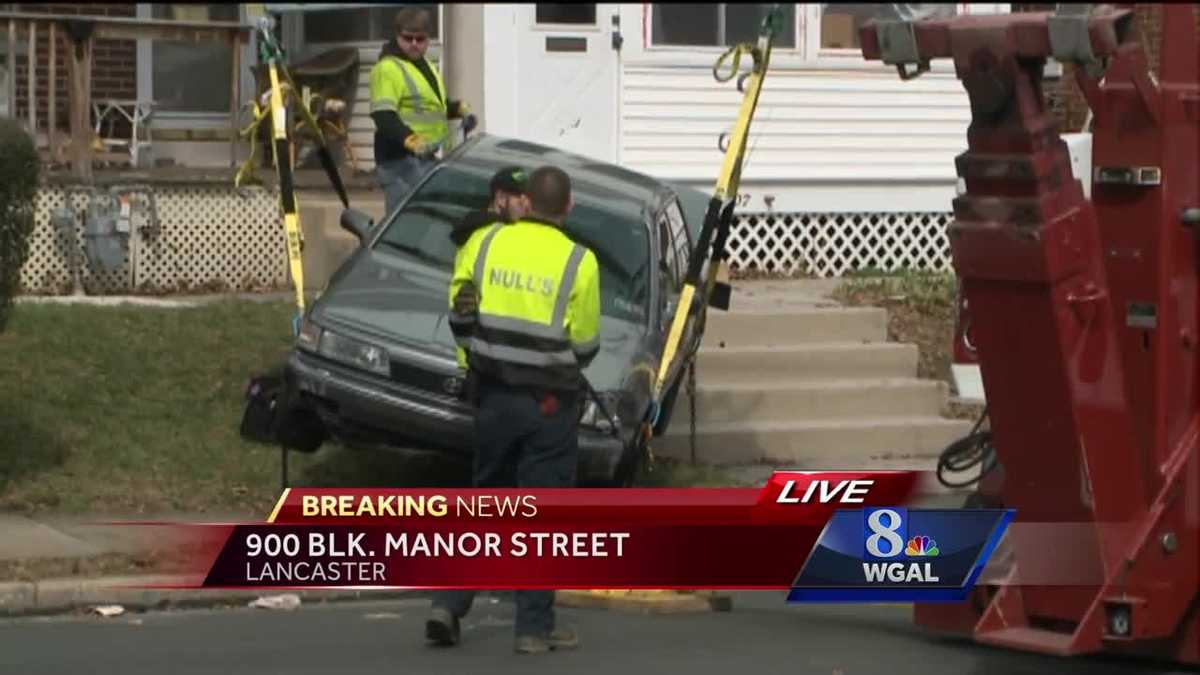Car plows into front porch of Lancaster home