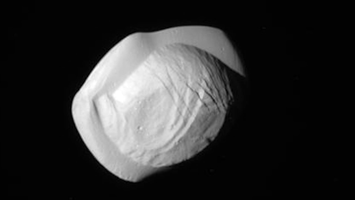 NASA releases pictures of Pan, one of Saturn's many moons