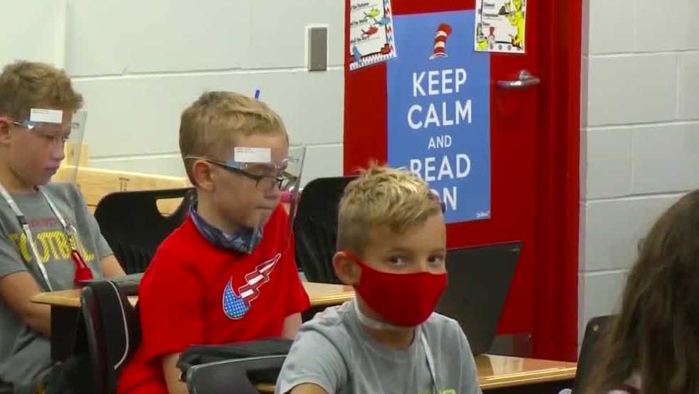 Return to school amid rising COVID-19 cases and mixed views on masks