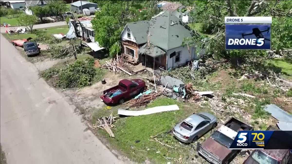 Sulphur residents work through rain to cleanup tornado damage