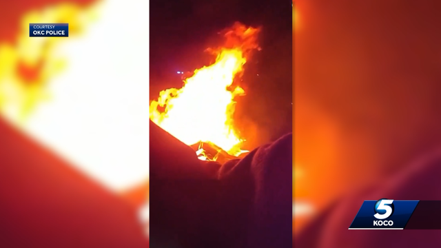 WATCH: OKC police and firefighters rescue unconscious driver from burning car