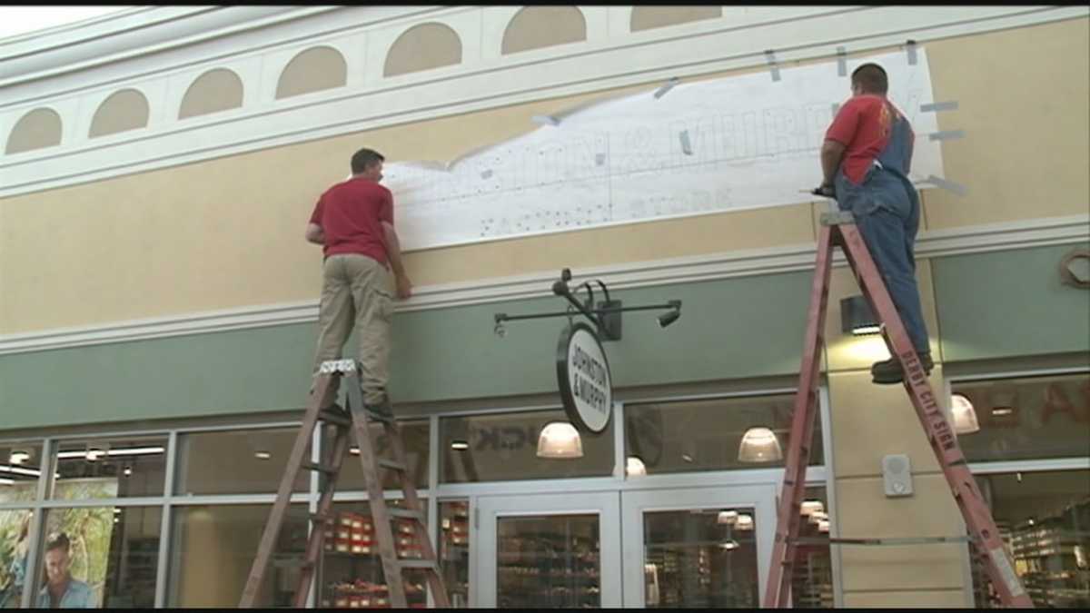 Stores put on final touches as new outlet mall prepares to open