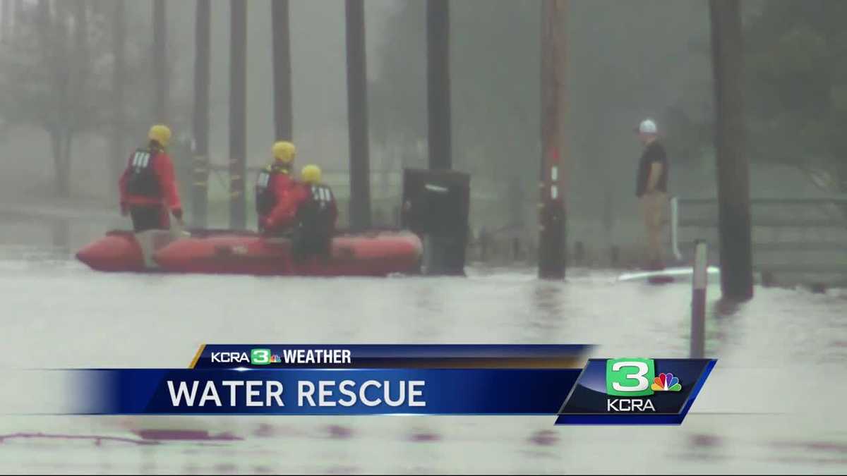 Man rescued from flood waters after trying to drive through