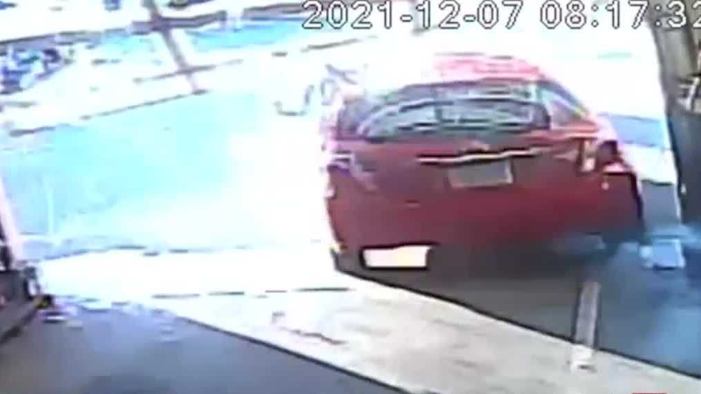 Man crashes stolen car through garage door in attempt to flee, police say