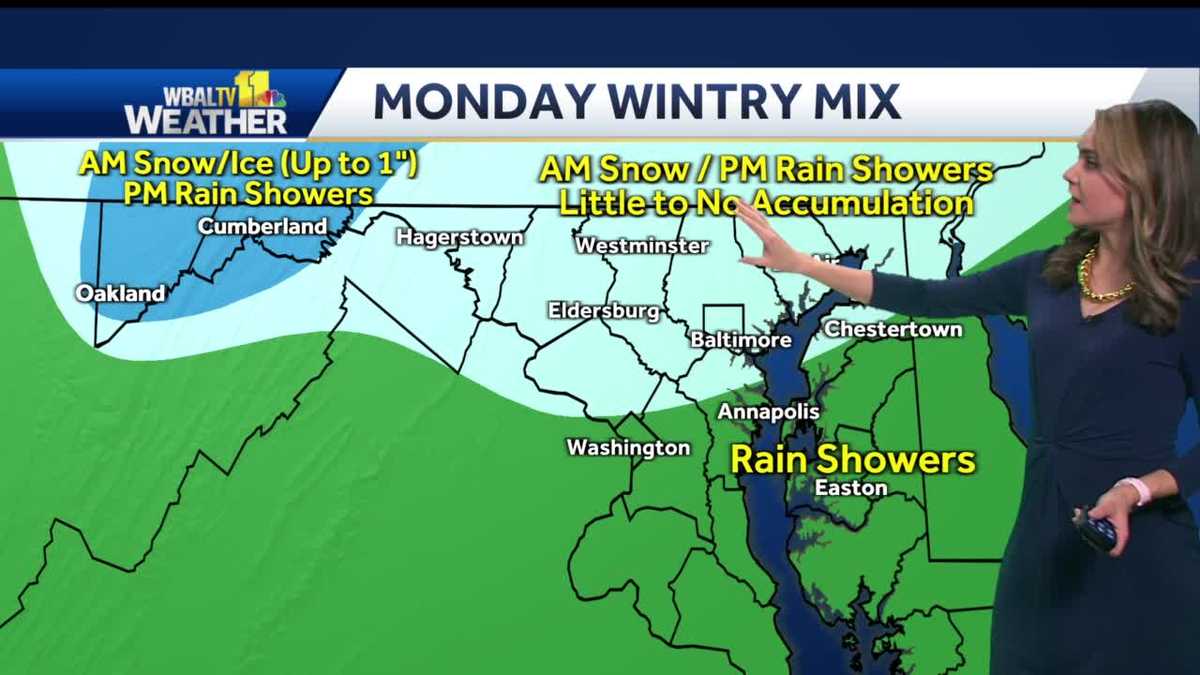 Light bands of snow morning, afternoon rain showers