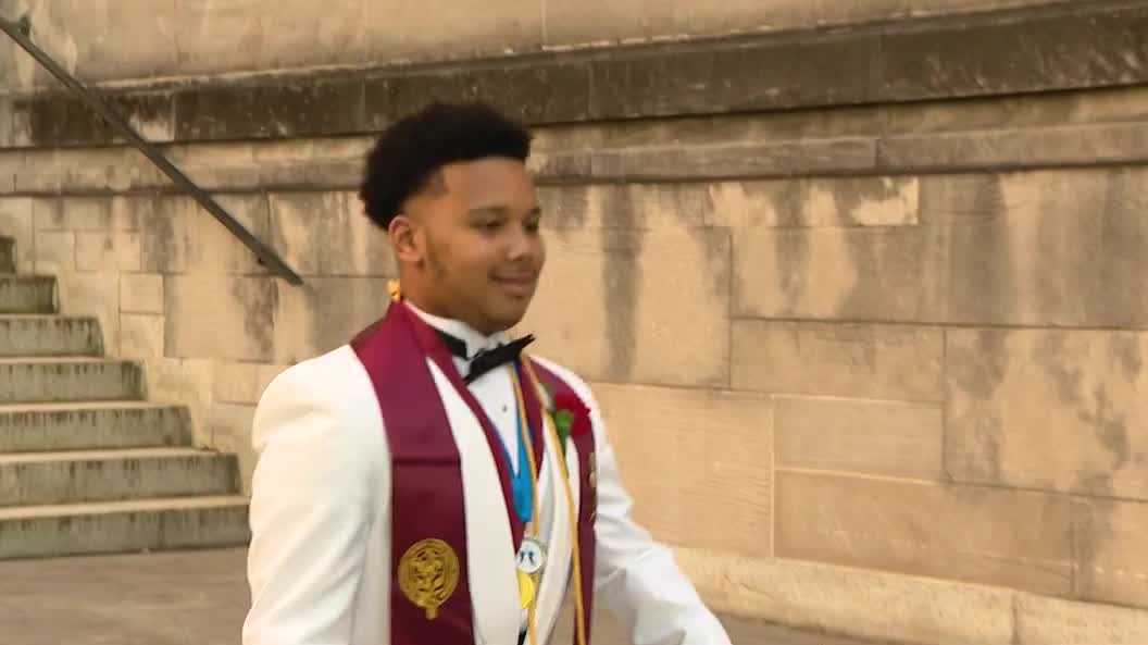 'He did it': Teen fights brain tumor to graduate high school