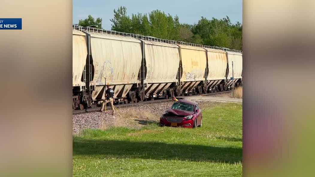 Train collides with car in Webster County, leaving two injured