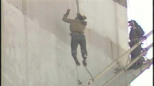 kcci archives: silo painters left dangling hundreds of feet above des moines after scaffolding breaks