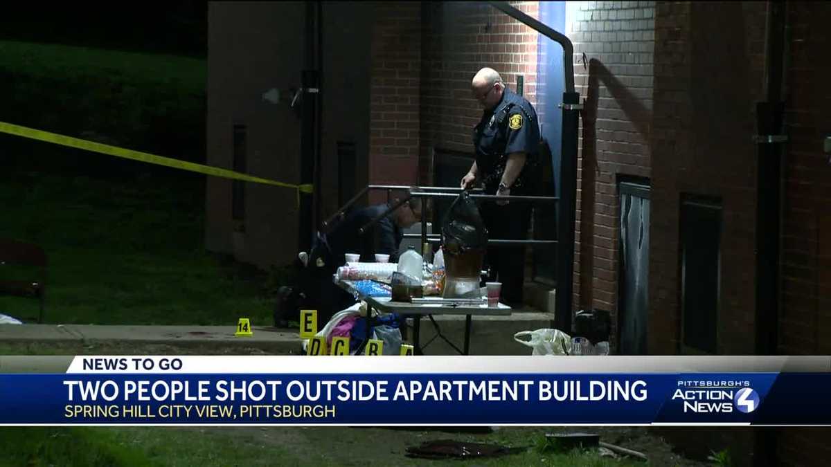 2 shot outside apartment building in Spring Hill