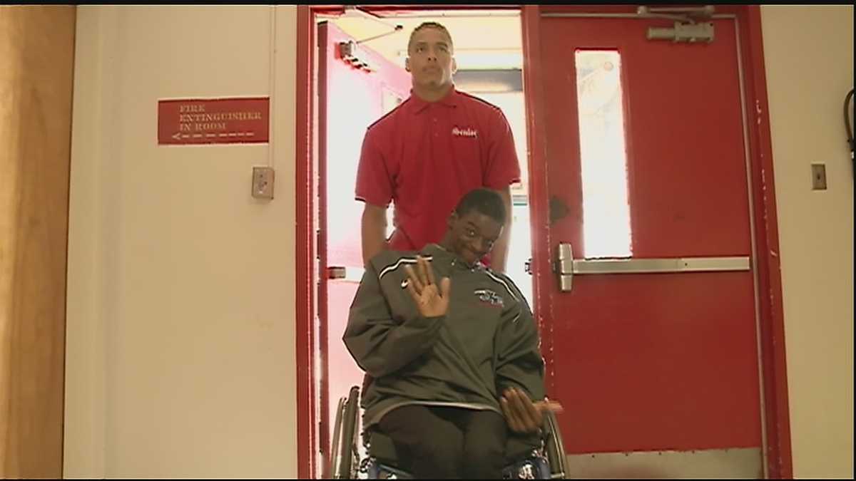 Students applaud as John Ehret star athlete gives king title