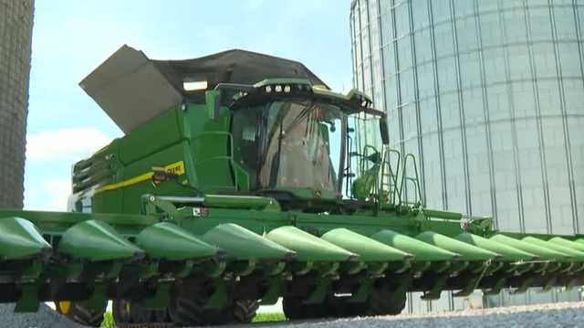 Pro driver takes combine for a spin ahead of IndyCar weekend in Iowa