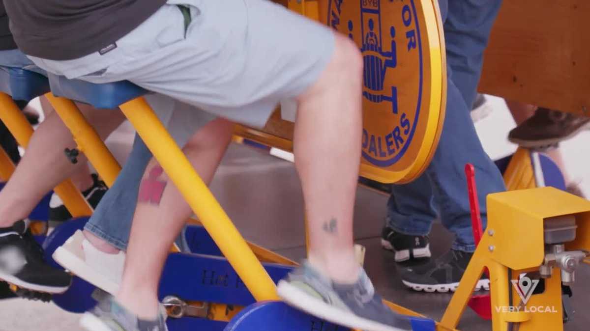 The Big Yellow Bike can take 16 people around Des Moines