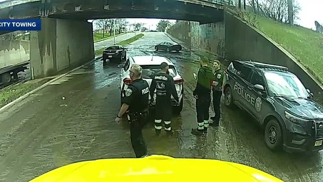 Tow companies rescue stranded drivers: 'Don't drive through standing water'