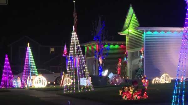 'she will remember this': indianola man decorates entire street as early christmas gift to his wife