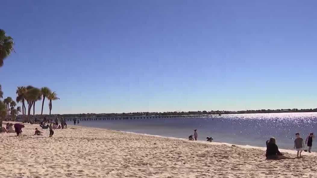 Cape Coral beachgoers embrace chilly weather as cold front hits Southwest Florida