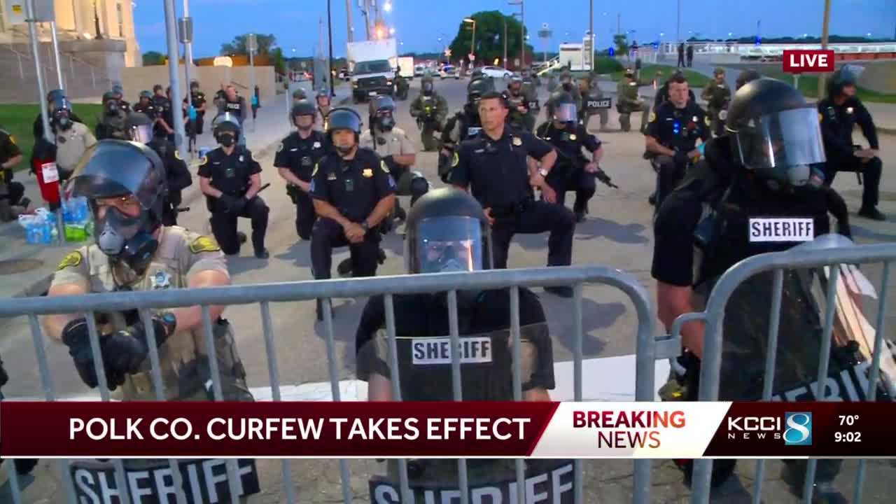 WATCH: Des Moines law enforcement kneels with protesters