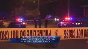 Police investigate after man found dead outside SUV
