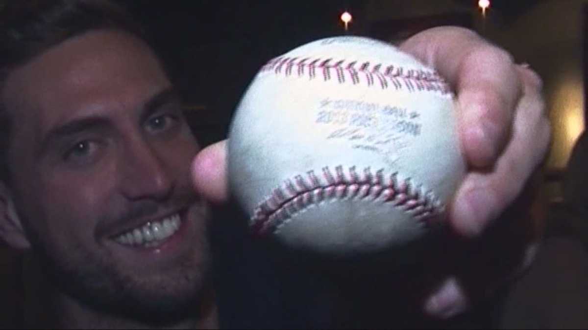 Fan who caught grand slam ball celebrates