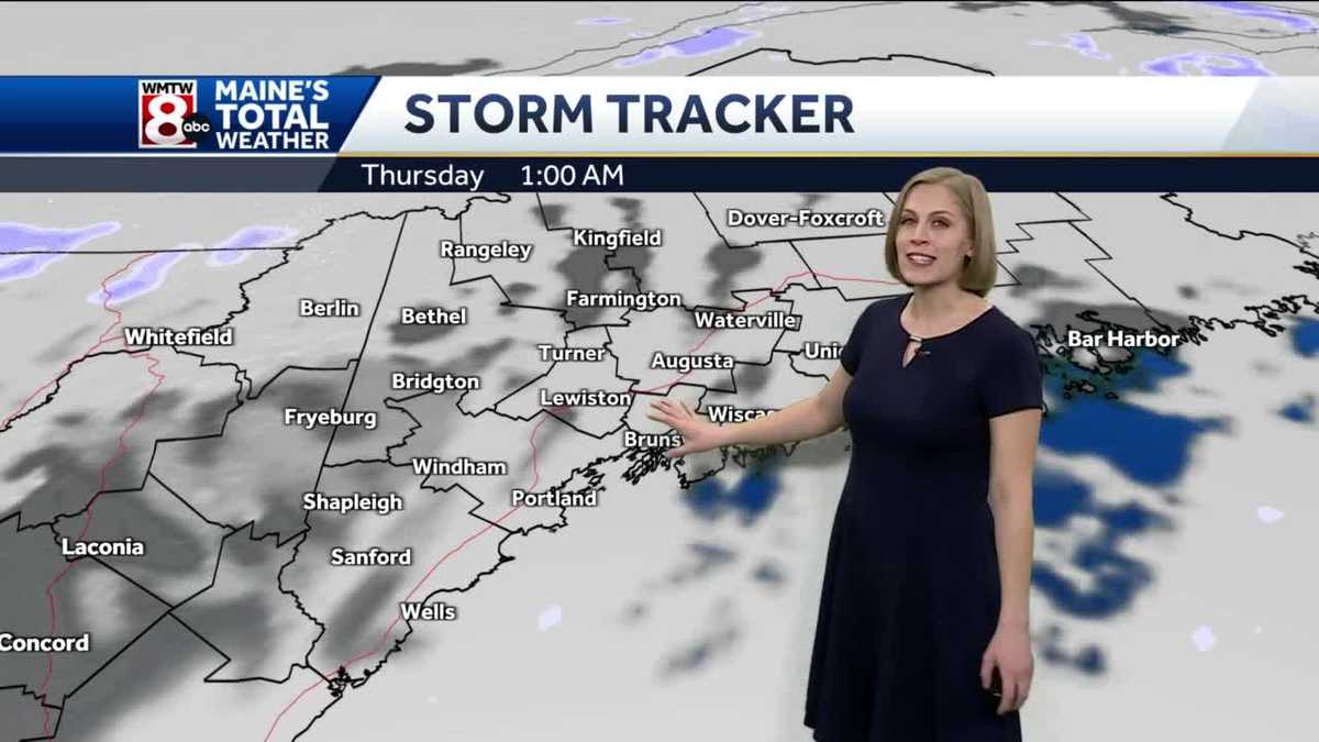 Breezy with a few rain & snow showers today