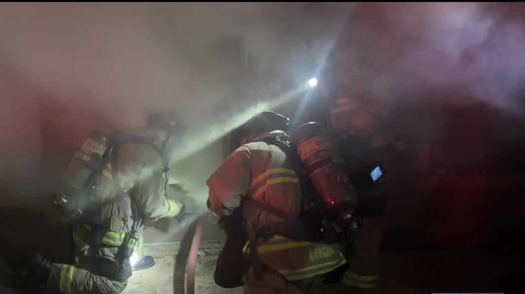 Two Albuquerque firefighters escape injury after floor collapses into basement fire