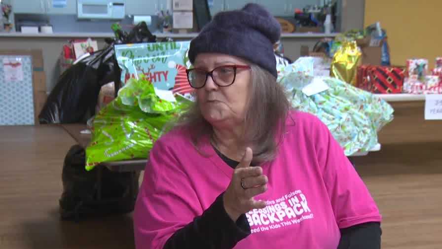 Blessings in a Backpack group holds toy and grocery giveaway in