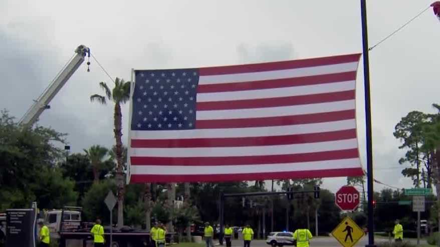 Community vigil held for Officer Raynor, who remains hospitalized after being shot in Daytona Beach - Vimarsana News