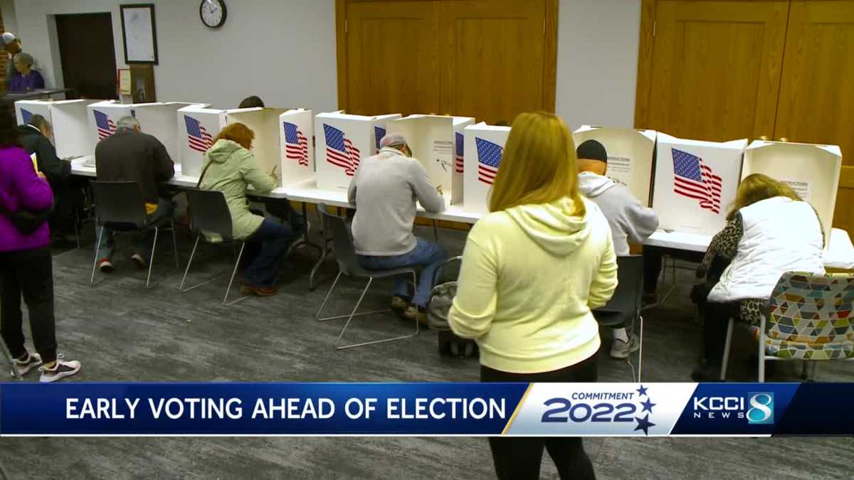 Early voters cast their ballot in West Des Moines