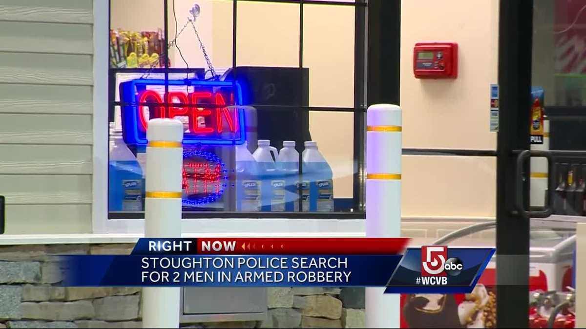 Police search for two men caught on camera in armed robbery