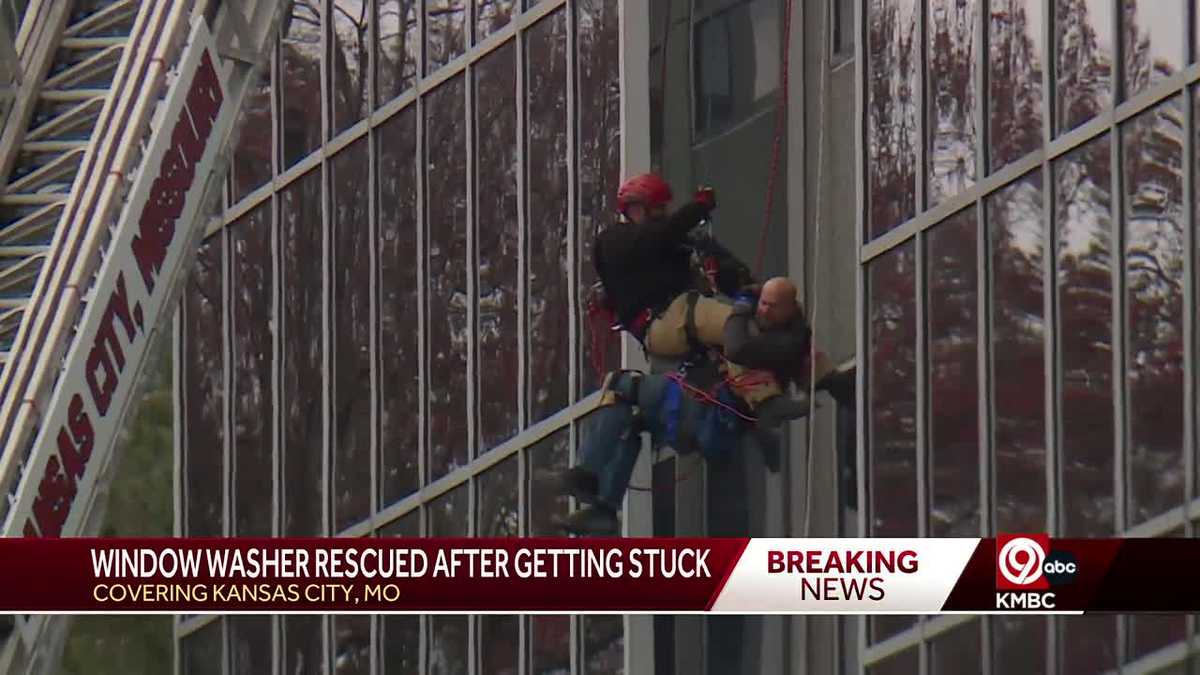 Kansas City window washer rescued while stuck eight stories up