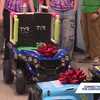Kansas City high school robotics students modify toy cars for children with challenges