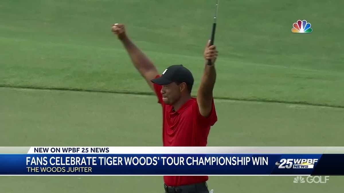 Fans celebrate Tiger Woods' tour championship win