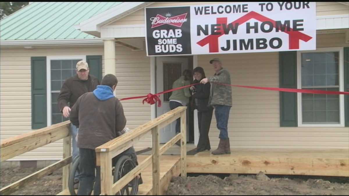Ribbon cutting held at paralyzed man's newly-built home