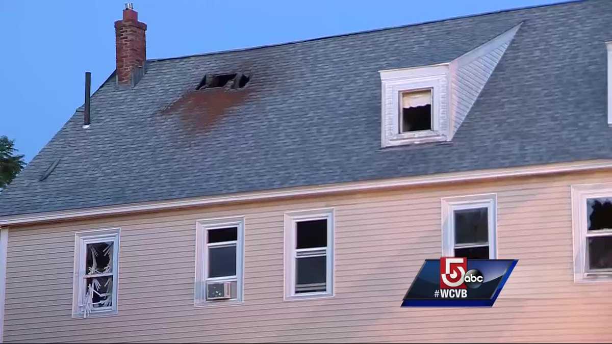 Mass. man jumps from burning building, firefighters rescue several others