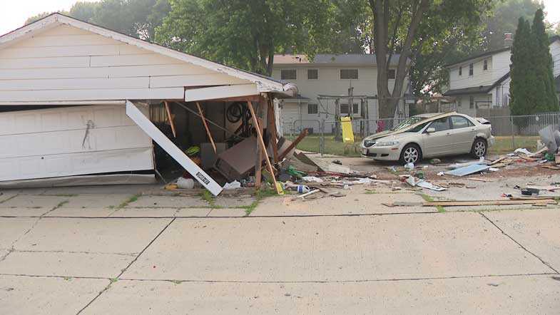 Police chase in West Allis ends with crash into garage and shed
