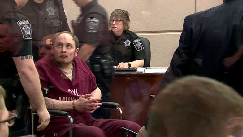 Officers pack courtroom as man accused of killing officer pleads not guilty