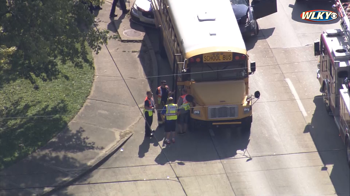 WATCH: 5 injured in crash involving 2 cars, school bus