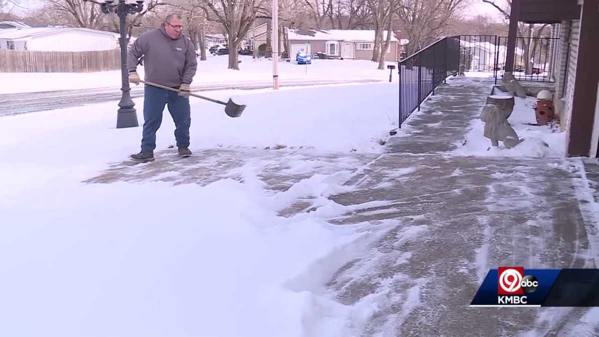 Wyandotte County, Kansas residents work around Wednesday's snow