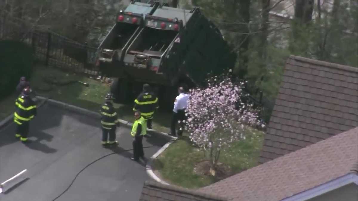 Raw video Aerial footage shows garbage truck crash in Newton