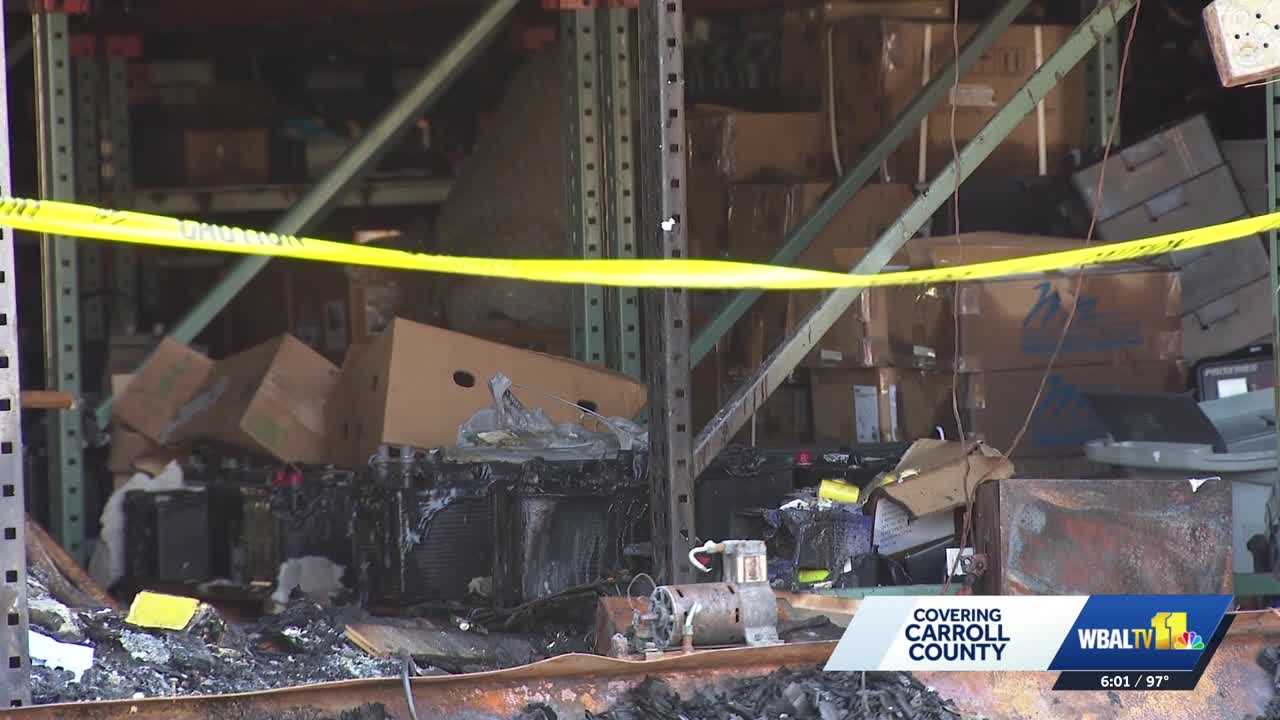 2 firefighters hurt, extensive damage in battery warehouse fire